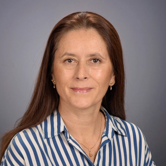 Ms Andrea